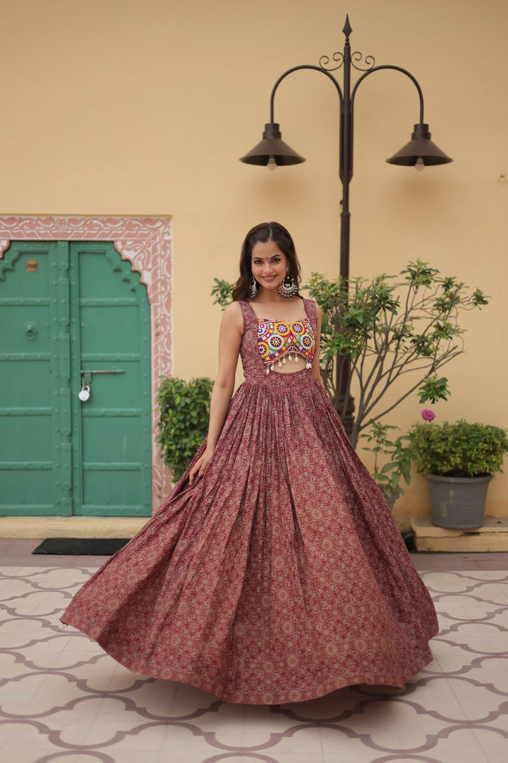 Maroon Color Printed Cotton With Kutchi Gamthi Work and Kodi Lace.