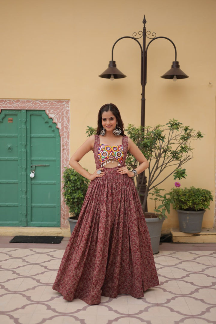 Maroon Color Printed Cotton With Kutchi Gamthi Work and Kodi Lace.