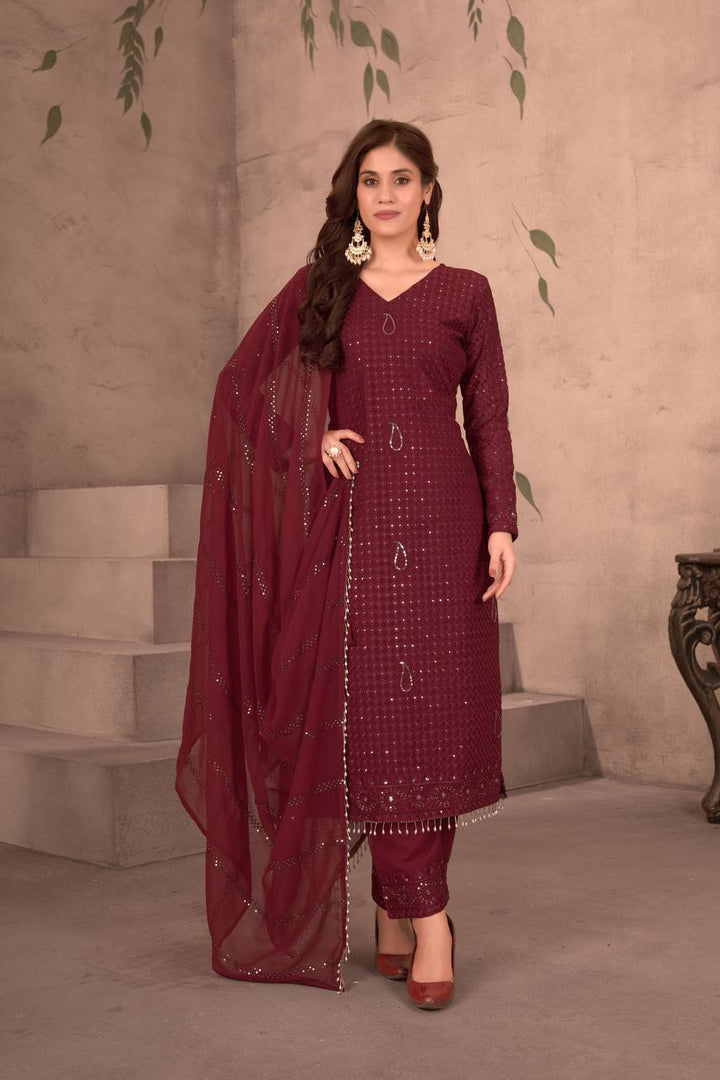 MAROON FAUX GEORGEET WITH EMBROIDERY SEQUENCE DESIGN WORK GOWN