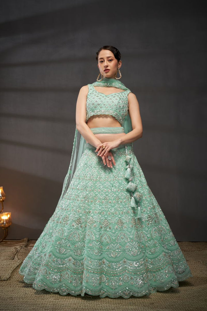 Turquoise blue Net Cutdana, Sequins and Zarkan embroidery Semi-Stitched Lehenga choli & Dupatta