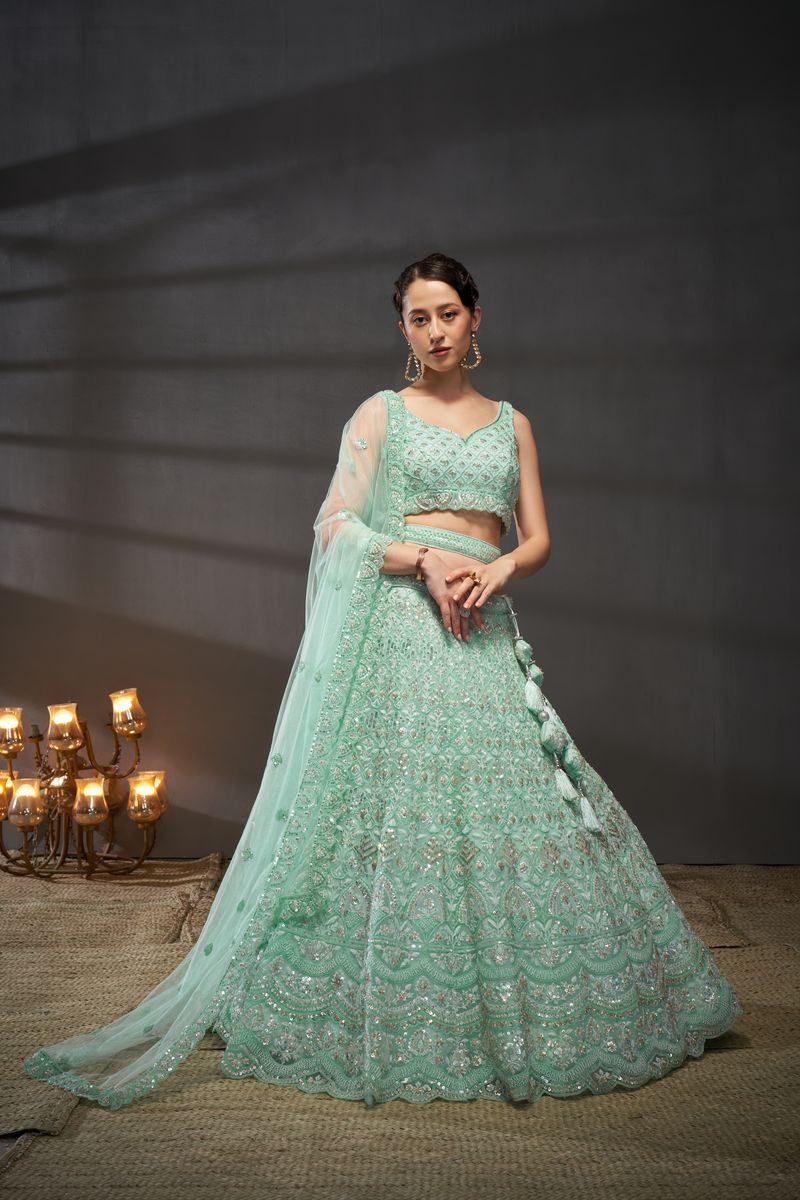 Turquoise blue Net Cutdana, Sequins and Zarkan embroidery Semi-Stitched Lehenga choli & Dupatta