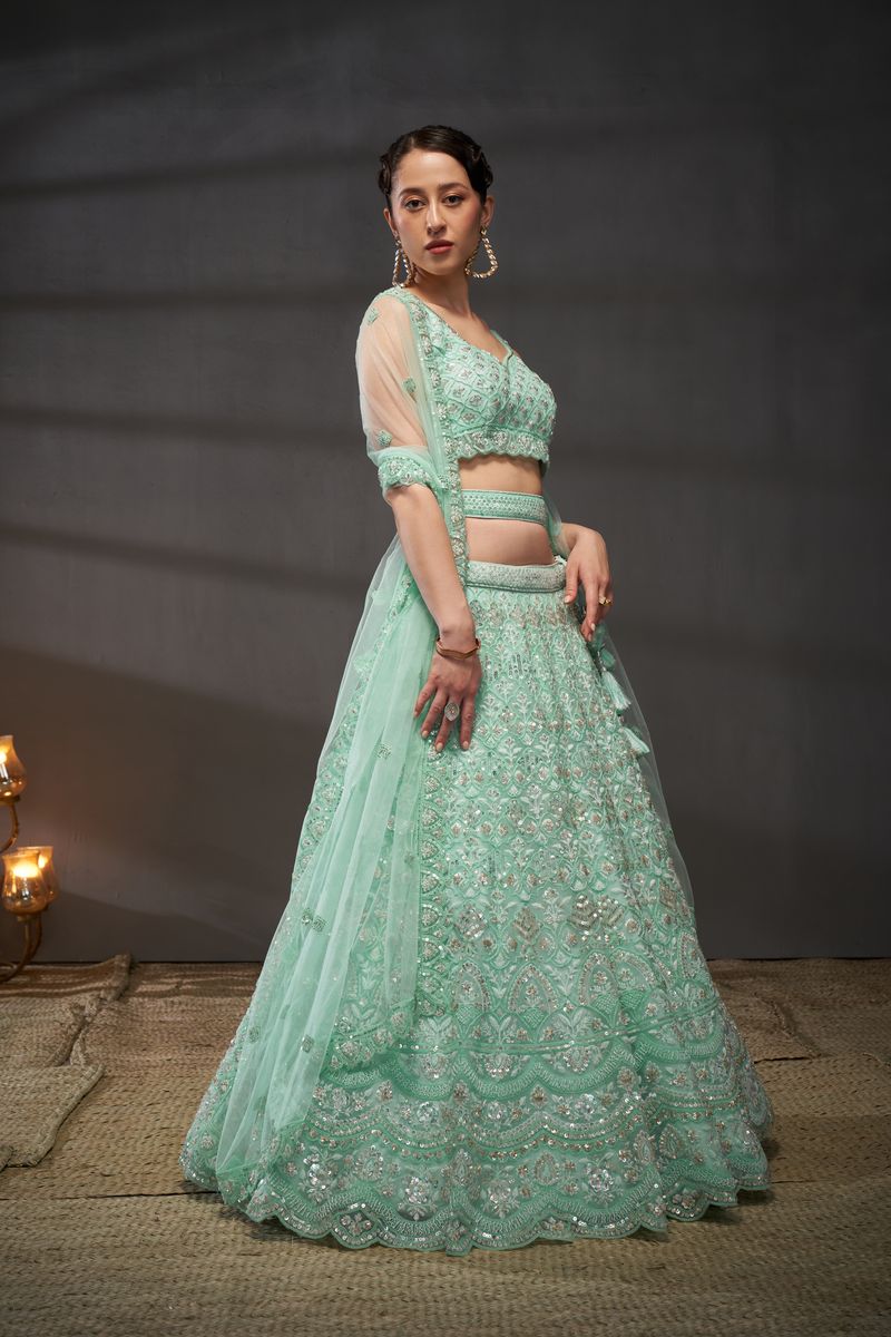 Turquoise blue Net Cutdana, Sequins and Zarkan embroidery Semi-Stitched Lehenga choli & Dupatta