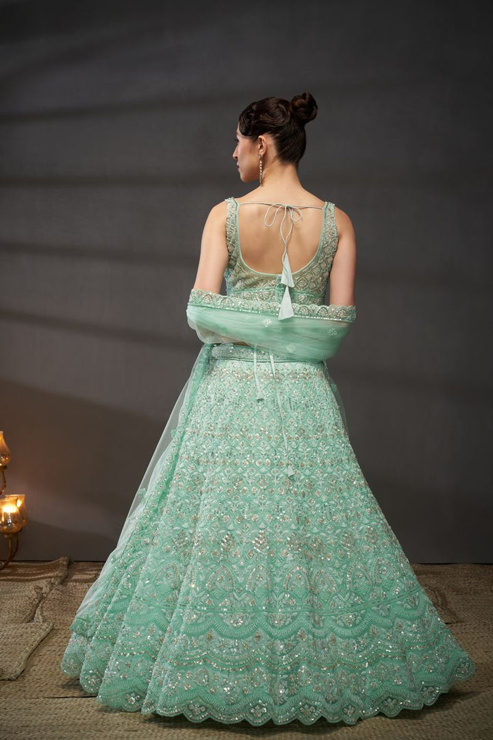 Turquoise blue Net Cutdana, Sequins and Zarkan embroidery Semi-Stitched Lehenga choli & Dupatta