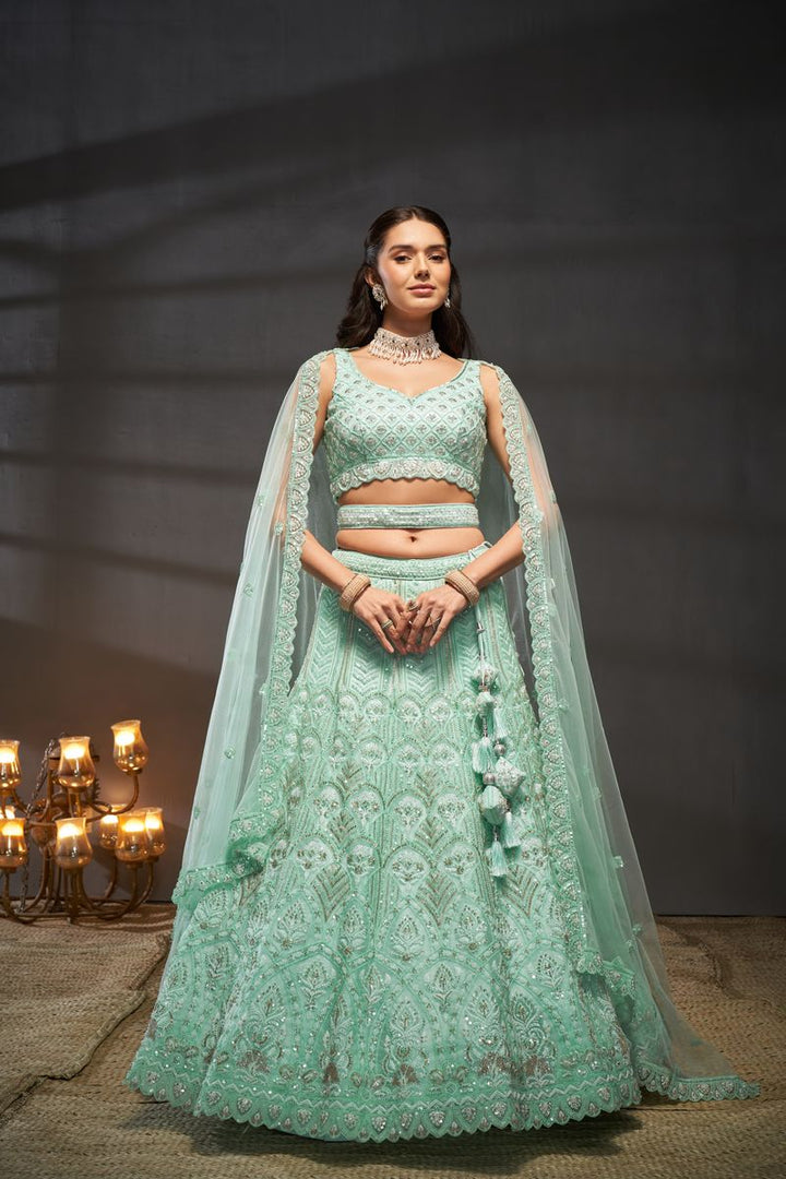 Turquoise blue Net Cutdana, Sequins and Zarkan embroidery Semi-Stitched Lehenga choli & Dupatta