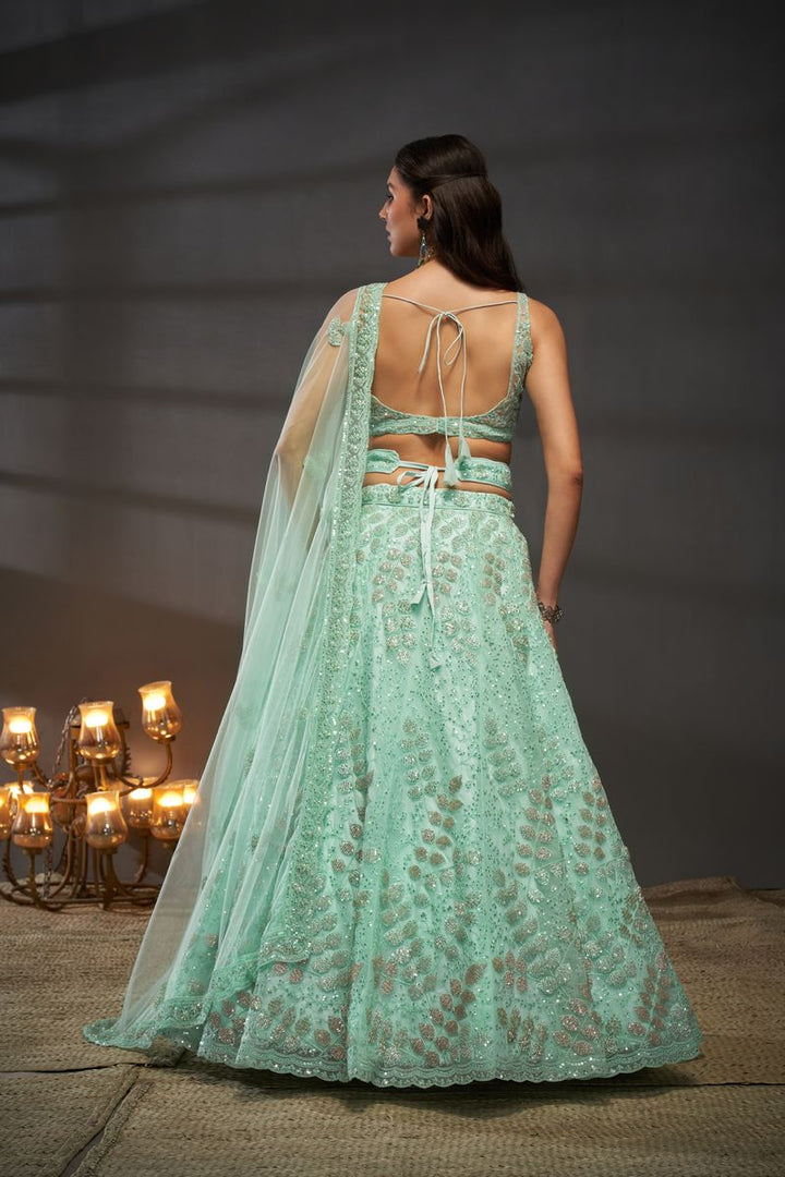 Turquoise blue Net Cutdana, Sequins and Zarkan embroidery Semi-Stitched Lehenga choli & Dupatta