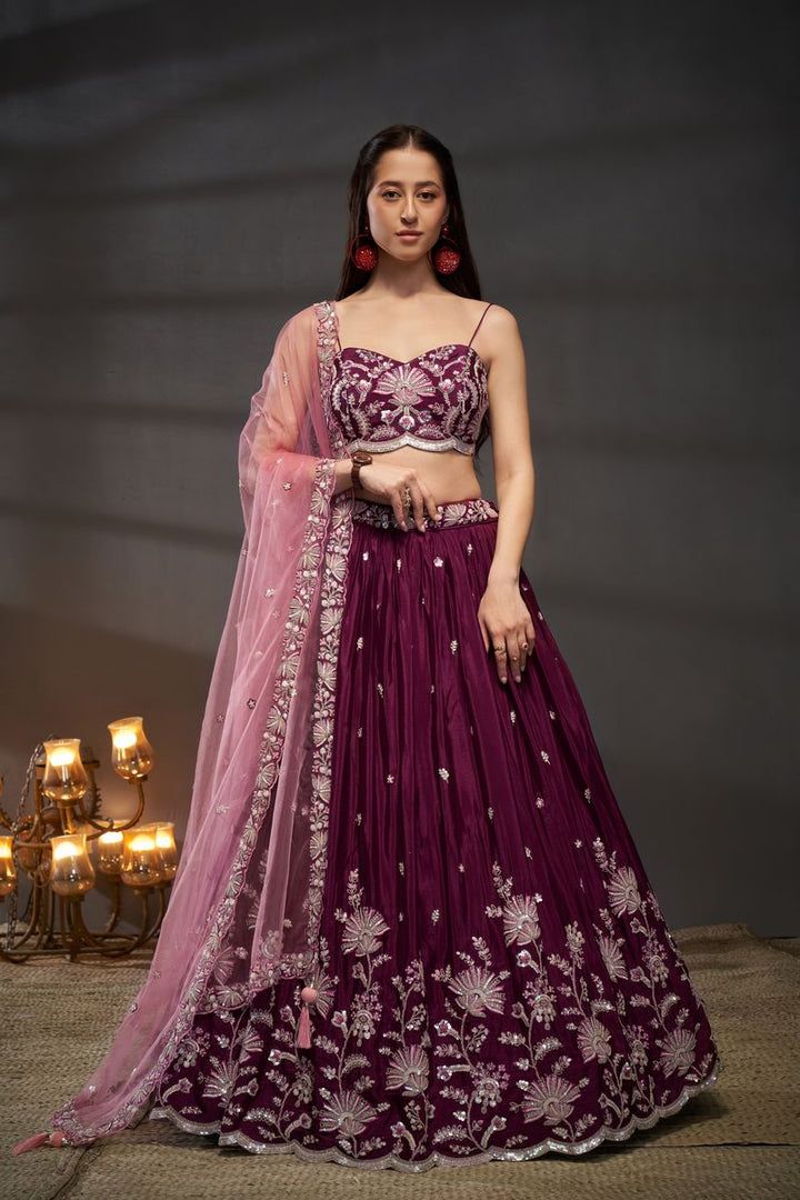 Burgundy semi-stitched lehenga choli with silver-golden sequin embroidery