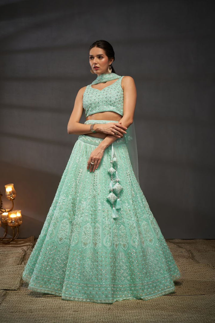 Turquoise blue Net Cutdana, Sequins and Zarkan embroidery Semi-Stitched Lehenga choli & Dupatta