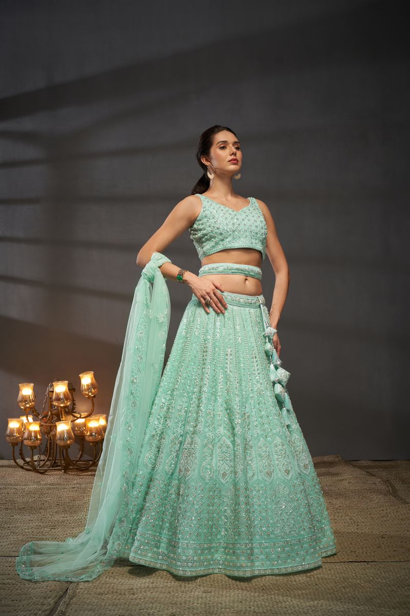 Turquoise blue Net Cutdana, Sequins and Zarkan embroidery Semi-Stitched Lehenga choli & Dupatta