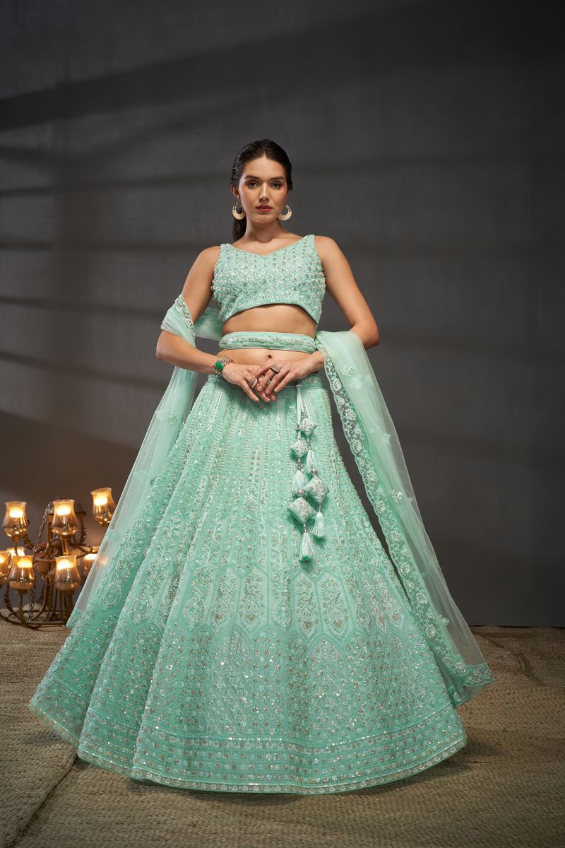 Turquoise blue Net Cutdana, Sequins and Zarkan embroidery Semi-Stitched Lehenga choli & Dupatta