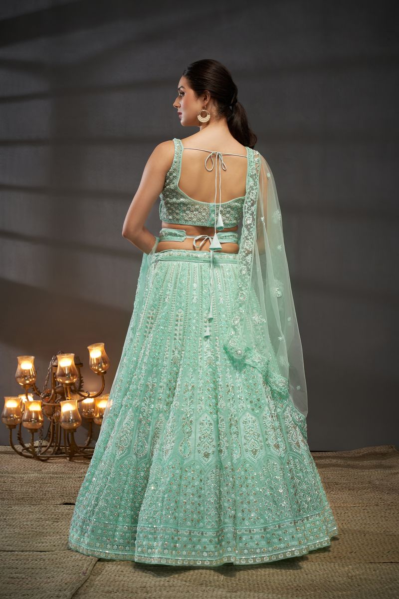 Turquoise blue Net Cutdana, Sequins and Zarkan embroidery Semi-Stitched Lehenga choli & Dupatta