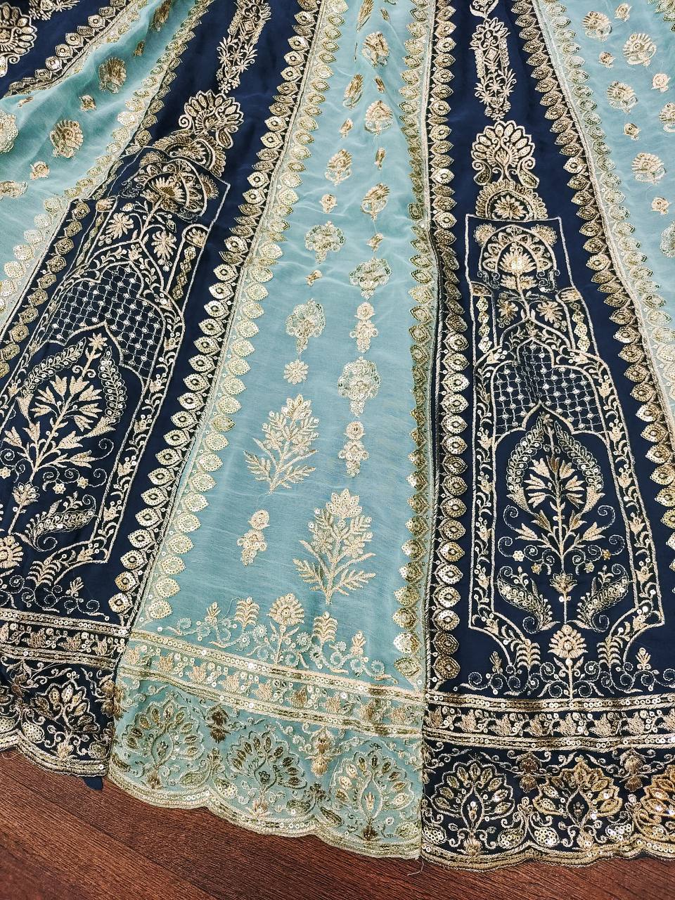 Beautiful royal blue faux georgette fabric with intricate embroidery, sequence, and zari design work