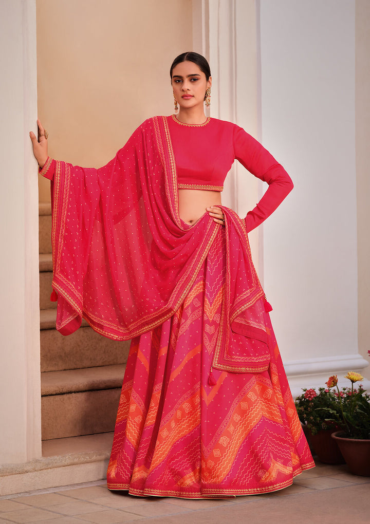 SHADES OF PINK DIGITALLY PRINTED GAJI SILK LEHENGA WITH BORDERS & BELT EMBROIDERY