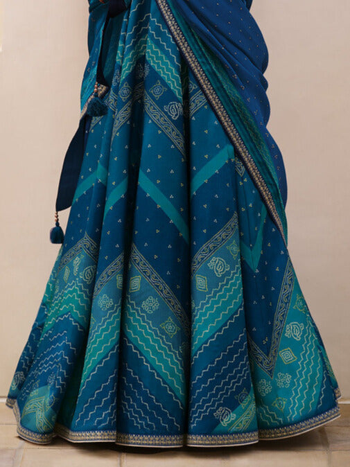 SHADES OF BLUE DIGITALLY PRINTED GAJI SILK LEHENGA WITH BORDERS & BELT EMBROIDERY