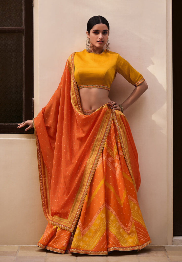 YELLOW & ORANGE DIGITALLY PRINTED GAJI SILK LEHENGA WITH BORDERS & BELT EMBROIDERY