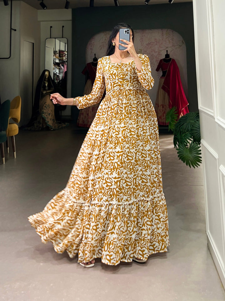 Mustard Georgette flowy, and printed Gown