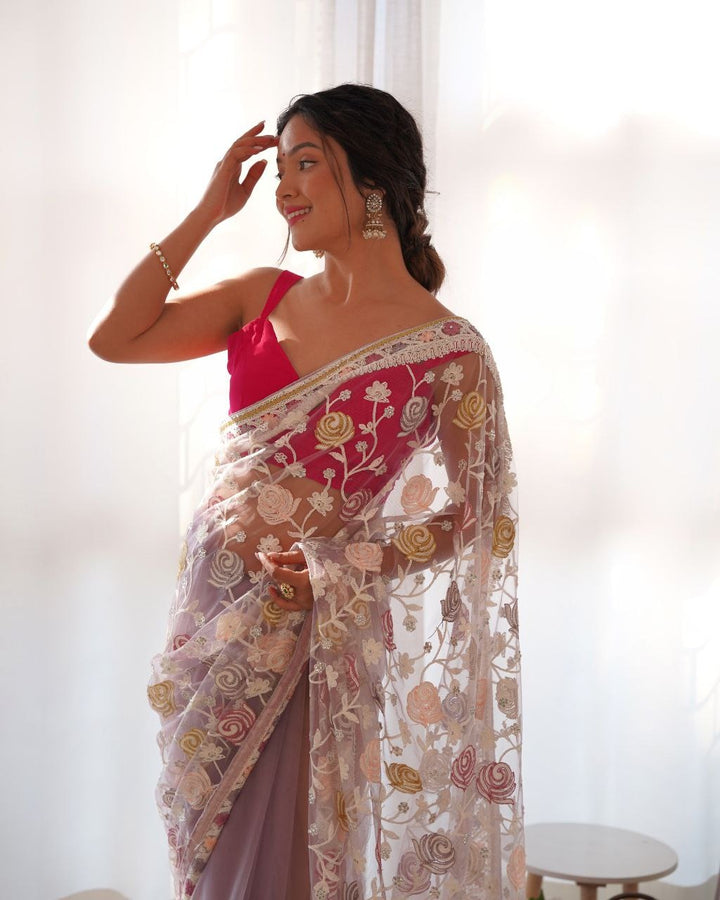 Off white saree with multicolored thread and Aari embroidery work