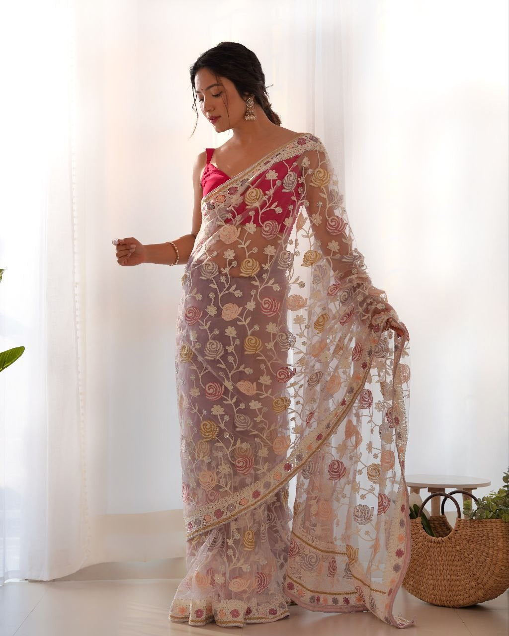 Close up of Butterfly Net Malty Color Thread & Aari Embroidery Work Saree in Off White Color with intricate floral designs and delicate thread work