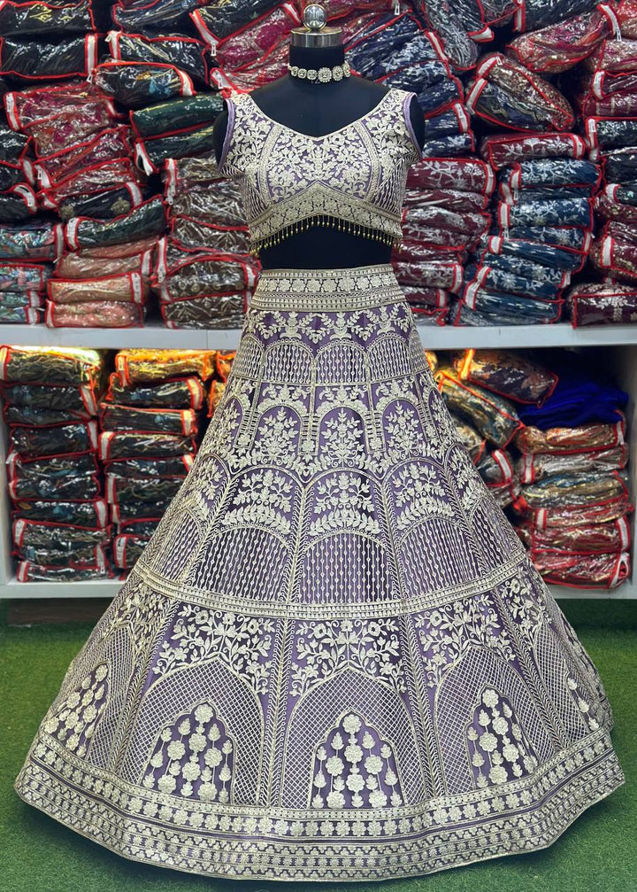 Off White HEAVY NET WITH EMBROIDERY SEQUENCE THREAD DESIGN WORK fabric draped over a mannequin in a fashion studio