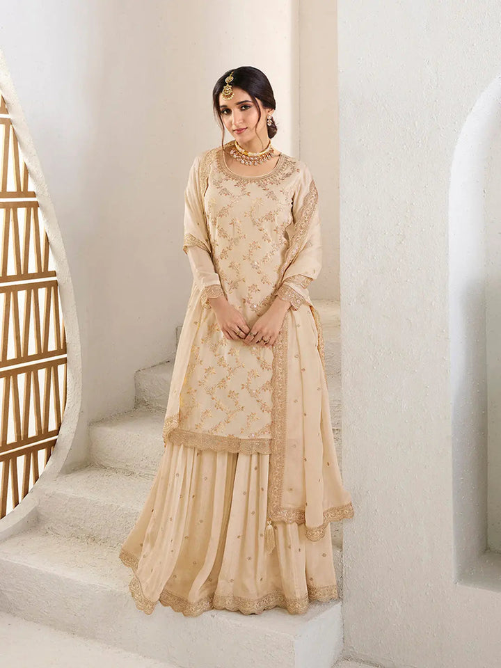 Off- white Jacquard Jaal work Sharara Suit Set by Qivii