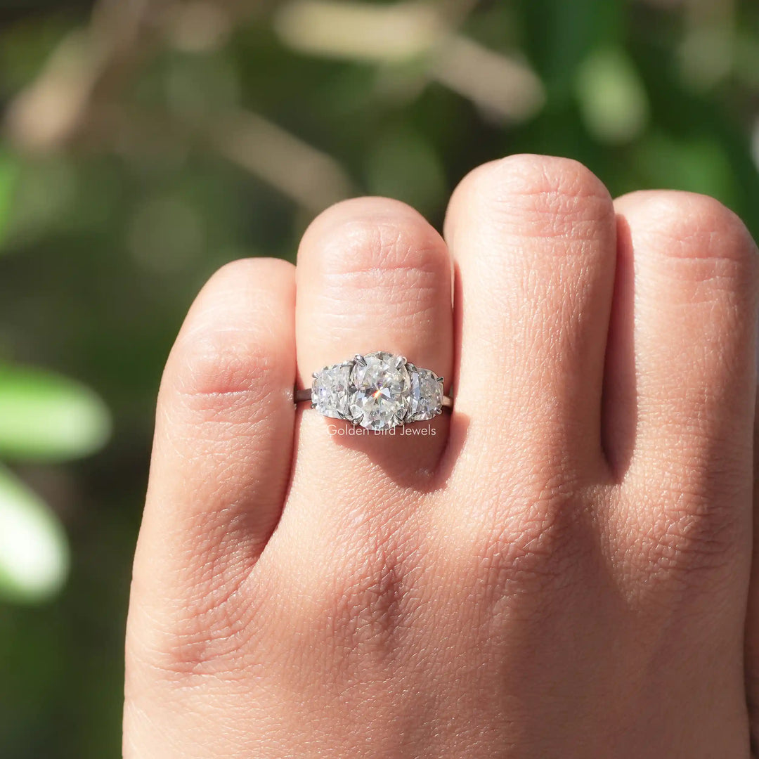 Oval And Half Moon Three Stone Moissanite Ring