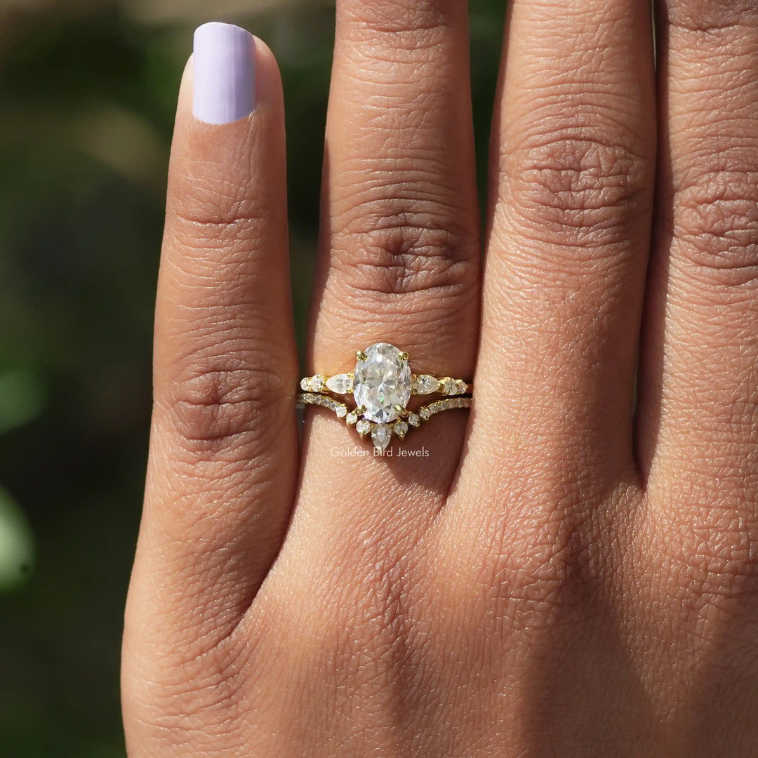 Oval Cut Moissanite Accent Stone Ring With Chevron Band