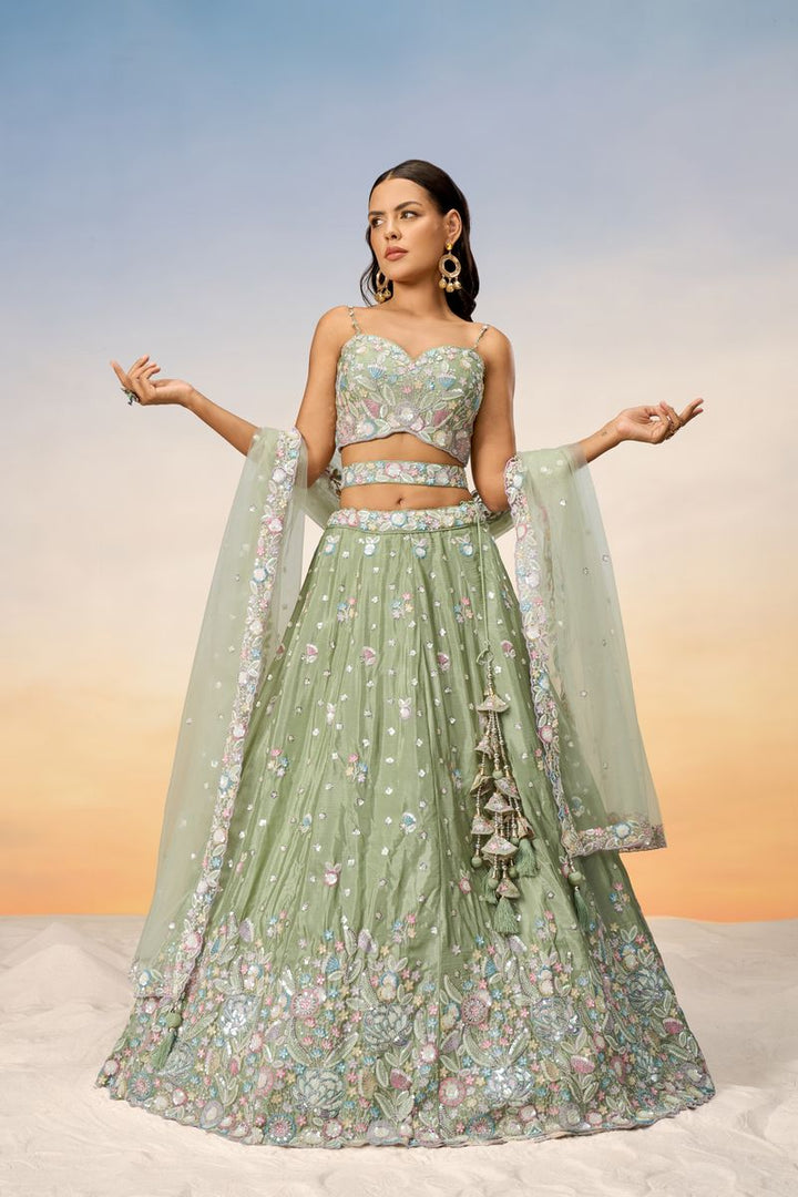 Lime green chiffon lehenga choli with intricate sequins and thread embroidery