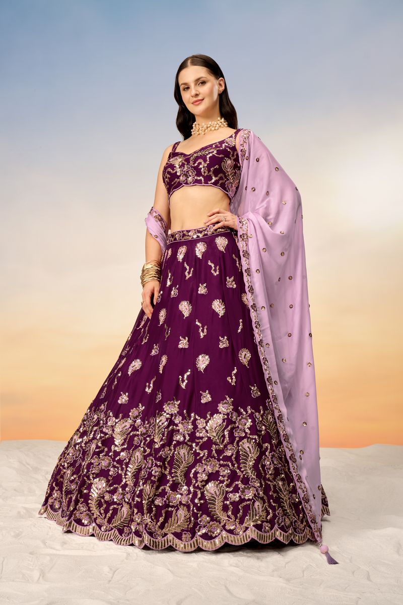 A stunning Burgundy Pure Georgette Lehenga choli with heavy Sequins embroidery
