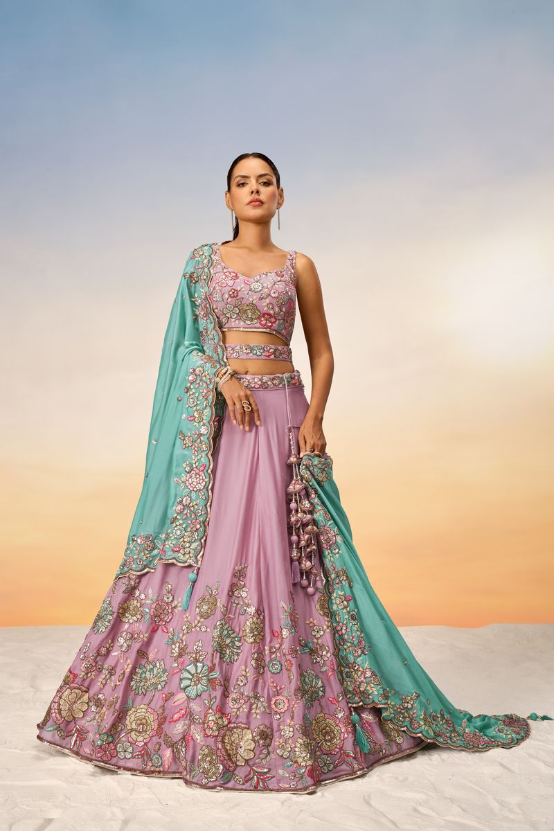 A beautiful lavender semi-stitched lehenga choli with multi-color thread, golden sequin, coding, and mirror work on pure georgette fabric