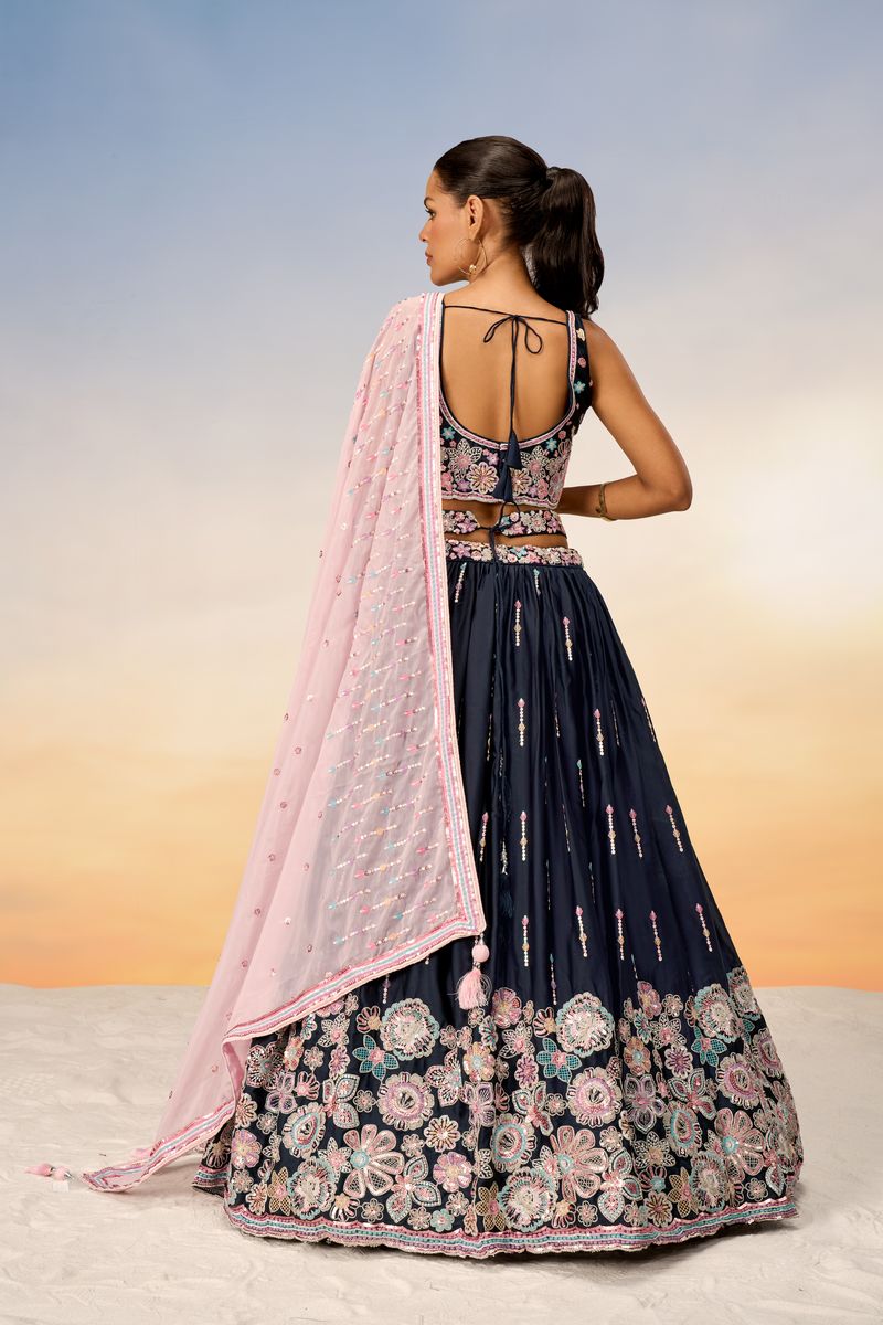 Semi-stitched lehenga choli in navy blue with beautiful satin silk embroidery and sequin detail