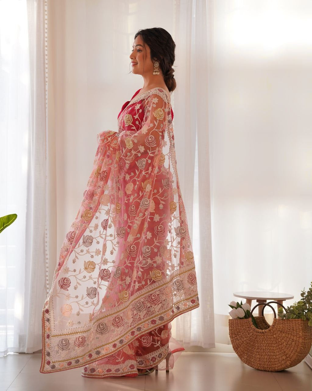  Beautiful pink saree with intricate Aari embroidery work 