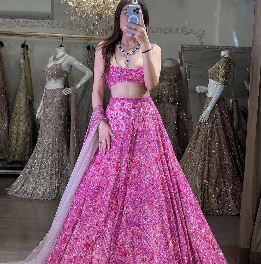  Elegant and stunning pink lehenga with delicate butterfly net fabric and intricate heavy thread embroidery