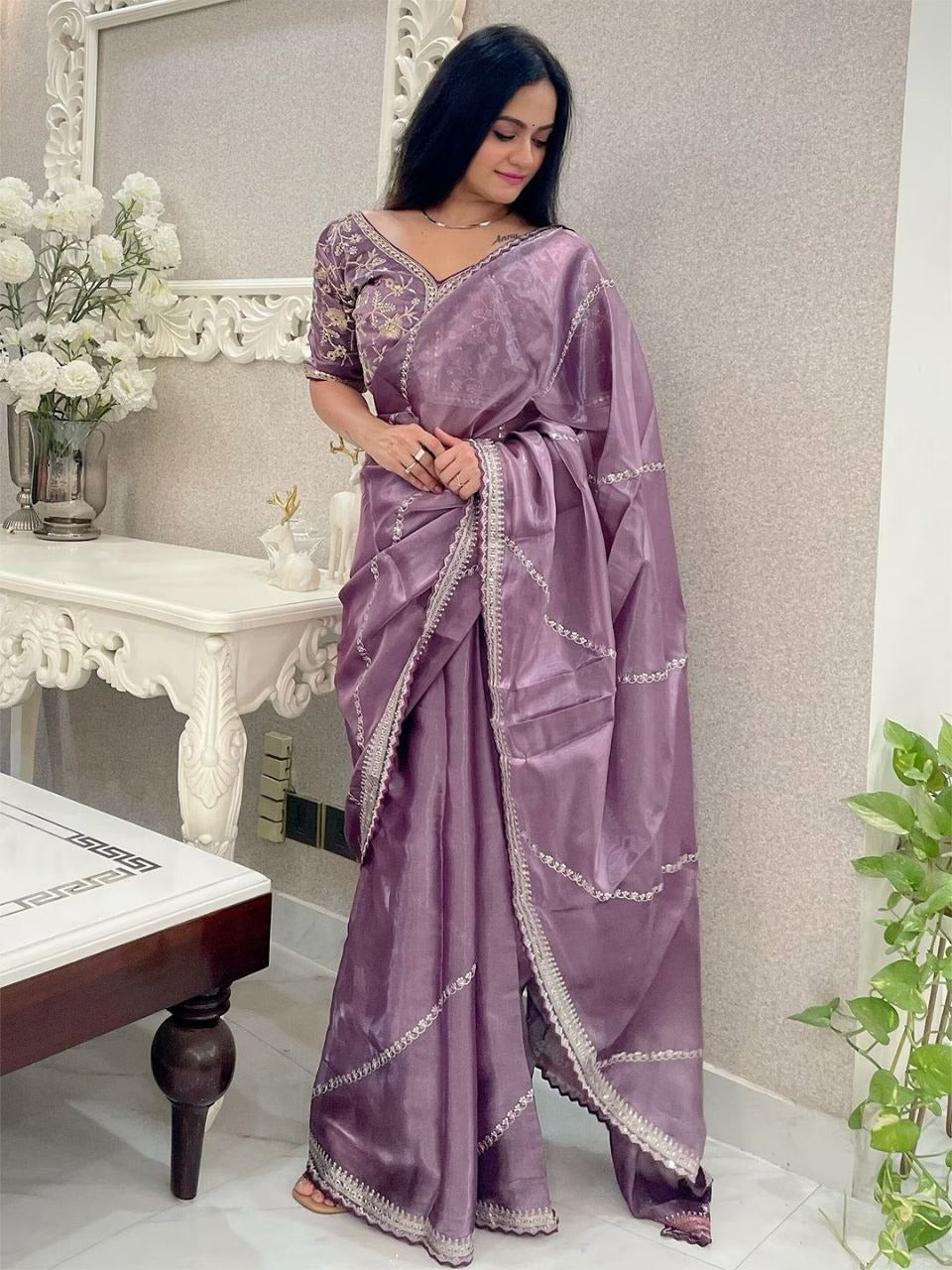 Close-up of the elegant embroidery work on the Soft Zimmy Choo Silk Designer Embroidery Work Saree In Purple Color