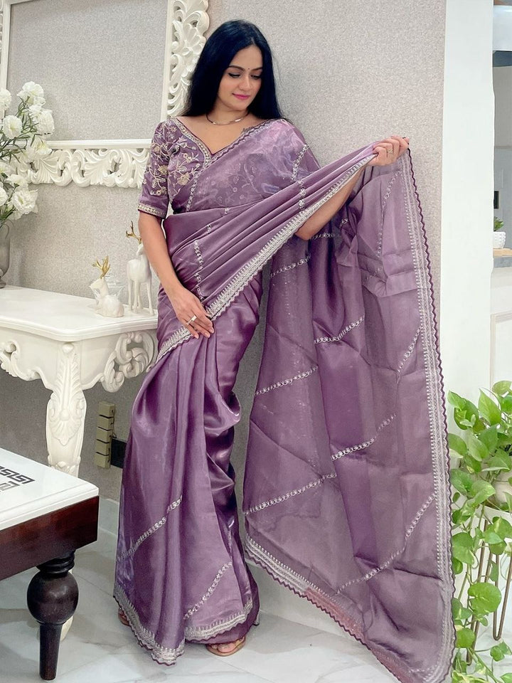 Soft Zimmy Choo Silk Designer Embroidery Work Saree In Purple Color with intricate floral patterns and delicate thread work 