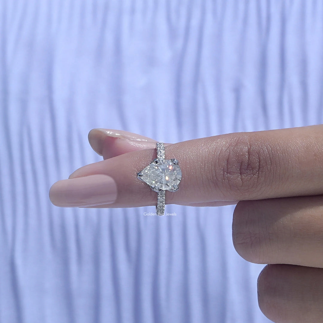 Pear Shaped Moissanite Accent Stone Ring