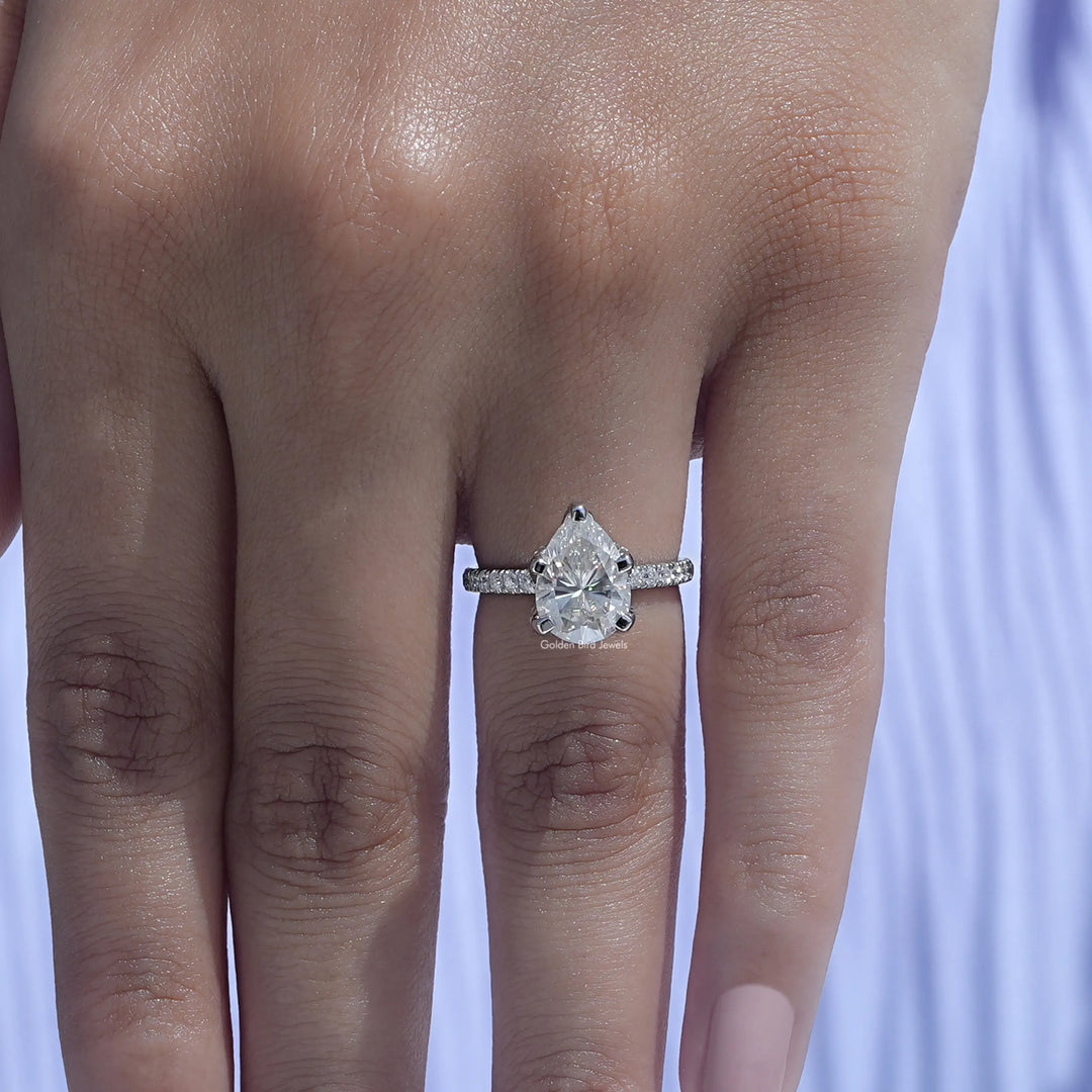 Pear Shaped Moissanite Accent Stone Ring