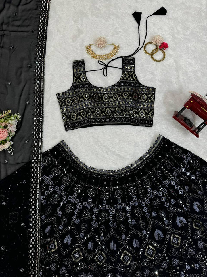 Gorgeous black Lehengha with detailed embroidery and sequin embellishments