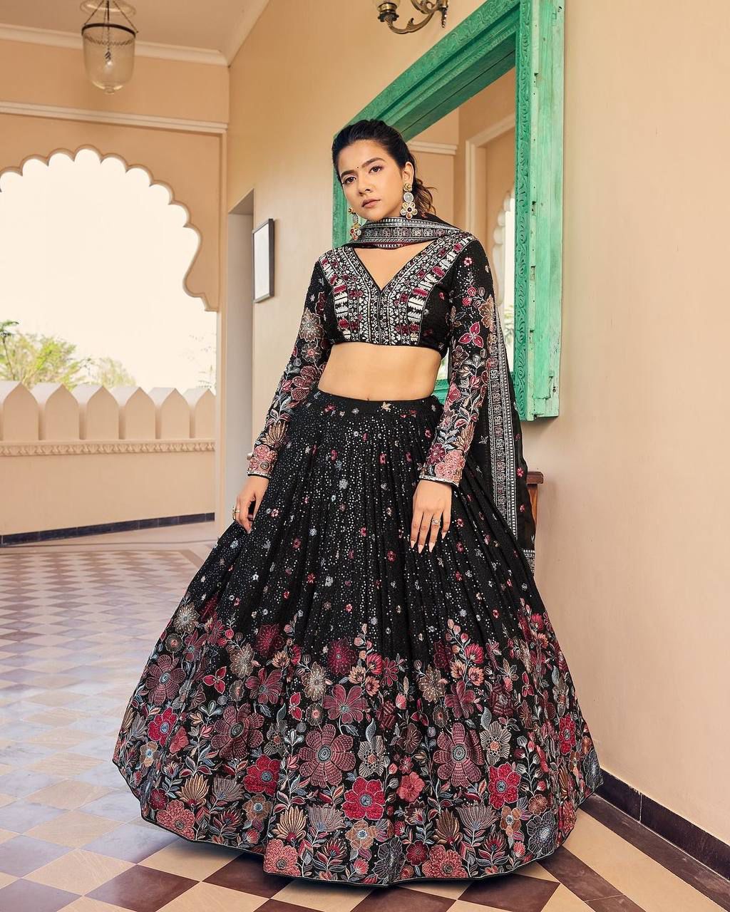 Black Foux gorgette Lehenga with intricate thread work and sequins, inspired by traditional Indian fashion