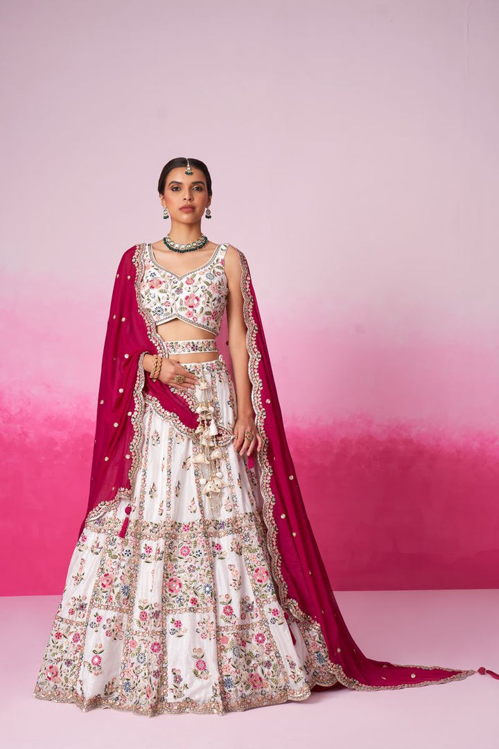 White Pure Georgette Sequins, Moti, Mirror and Thread Embroidered Semi-Stitched Lehenga in elegant white color with intricate sequins and mirror work