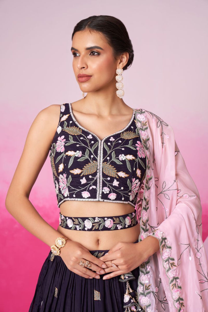  Semi-stitched lehenga choli with intricate thread and coding work