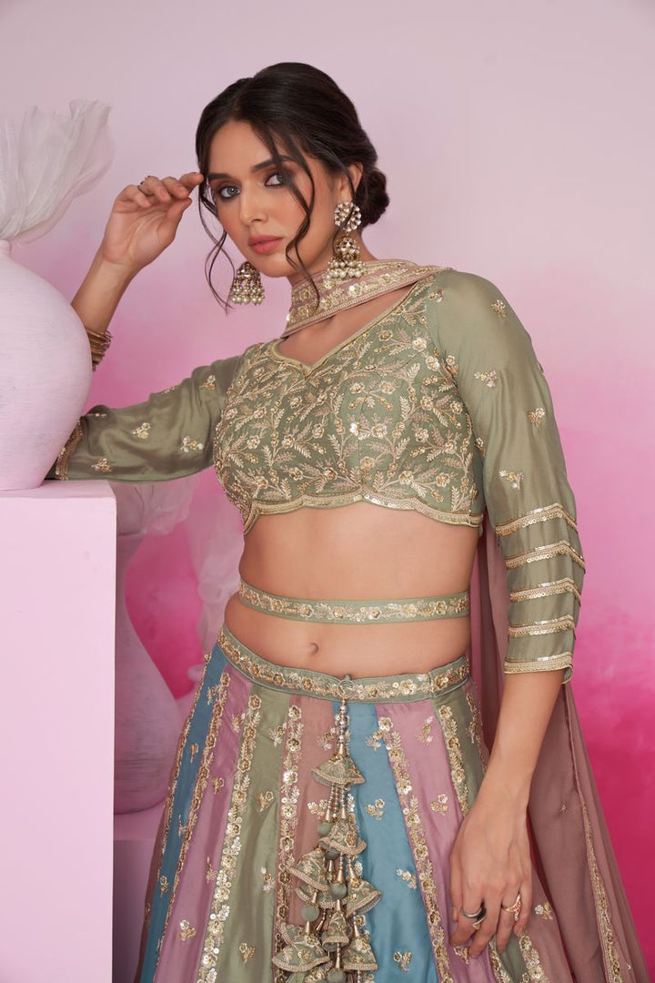 Beautiful Limegreen Georgette Lehenga Choli with Golden Sequined Embroidery