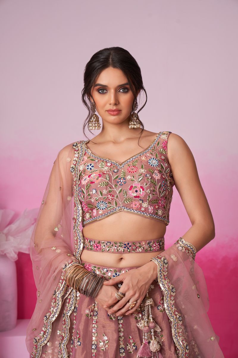 Beautiful semi-stitched Bridal Lehenga Choli in Rose gold with Net Moti