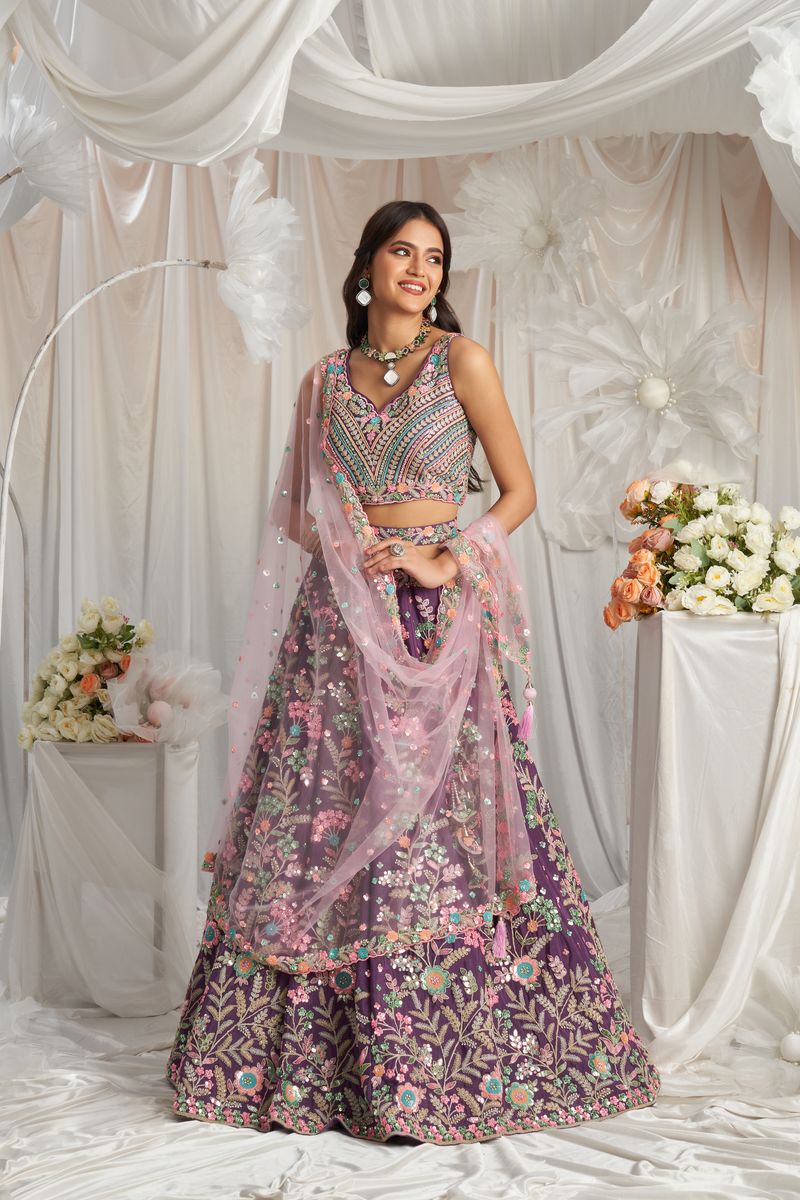 Purple, multi-color sequined and thread embroidered pure georgette lehenga choli