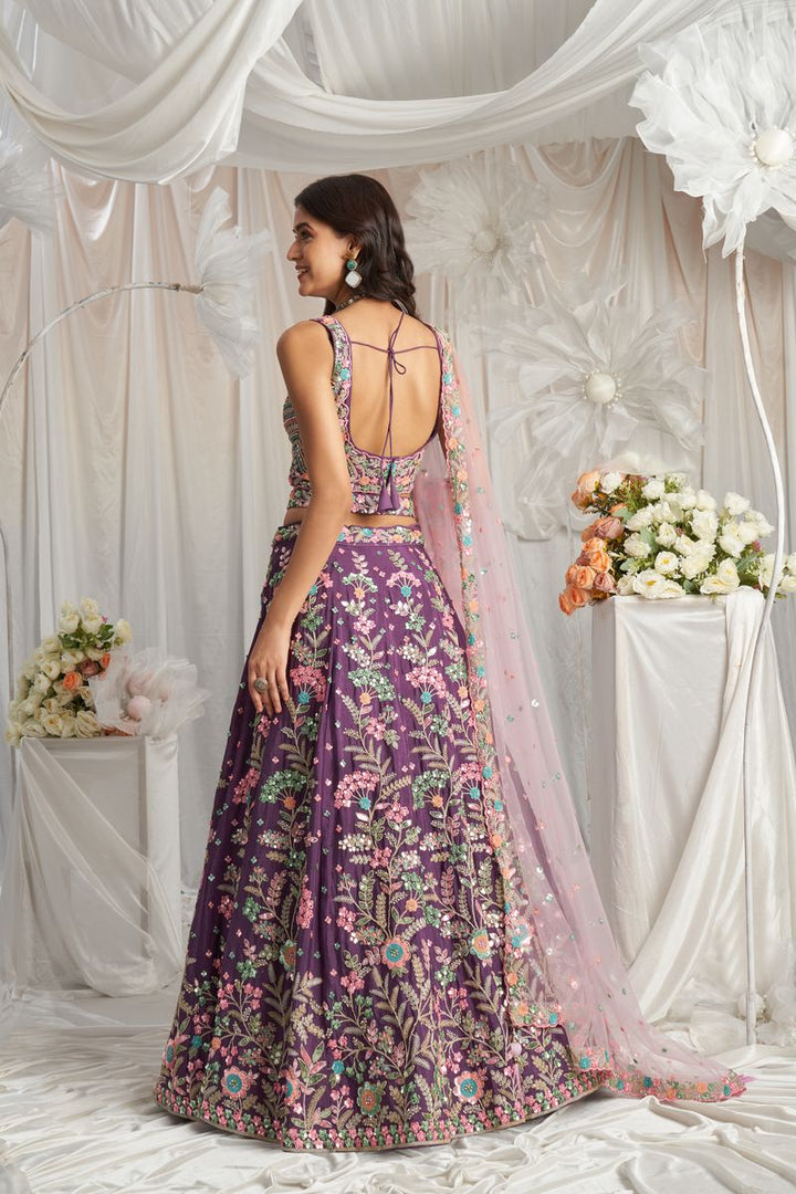 Beautiful purple multi-color sequined, thread, and zarkan embroidered pure georgette semi-stitched lehenga choli