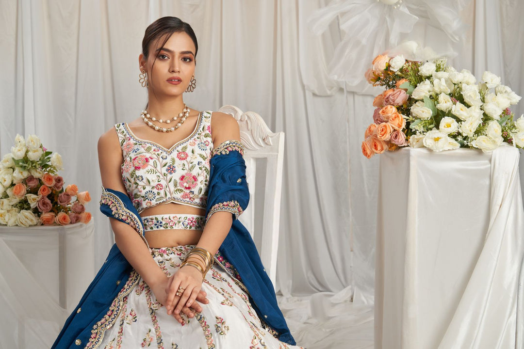 Navyblue and white lehenga with intricate sequins and thread work