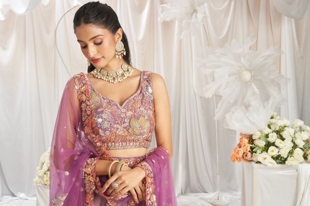 Beautiful lavender organza lehenga choli with sequin embroidery and matching dupatta