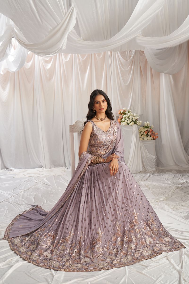  Semi-stitched lehenga choli in mauve with intricate sequin embroidery