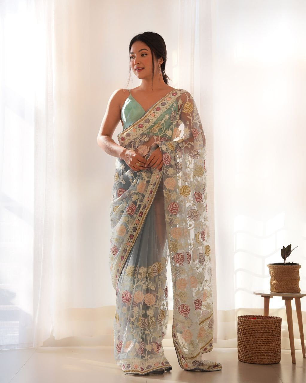 Beautifully designed saree with butterfly net malty color thread and aari embroidery