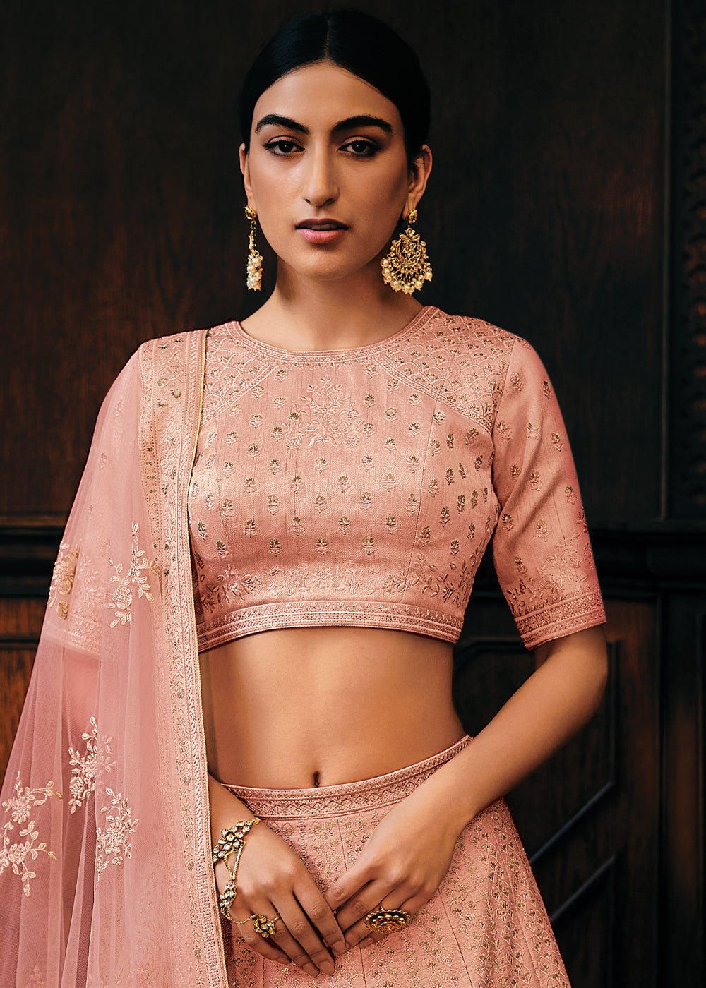 Pinkish Orange Raw Silk Lehenga Choli with Embroidery Work  - By Qivii