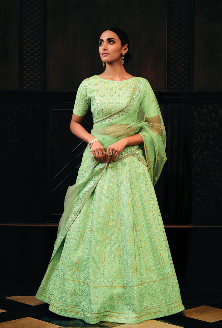 SCREAMIN GREEN RAW SILK LEHENGA CHOLI WITH EMBROIDERY WORK