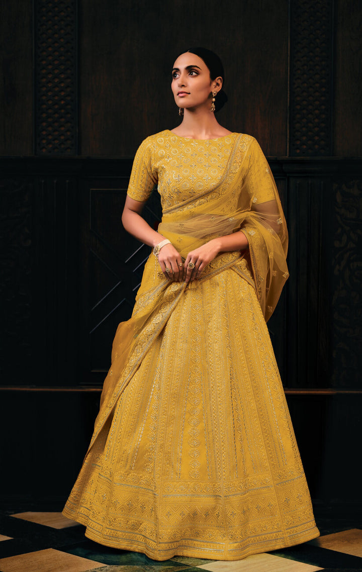 BUTTERSCOTCH YELLOW RAW SILK LEHENGA CHOLI WITH EMBROIDERY WORK